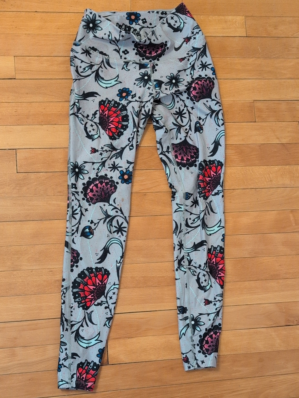 Nike Girls' Gray Floral Leggings with Pink and Black Accents
